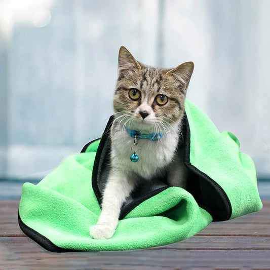 Quick-Drying Pet Bath Towel - Lint-Free in green wrapped around a cat. Soft, absorbent microfiber towel ideal for pet grooming and drying.