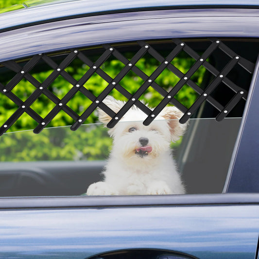 Expandable lattice-style car window barrier keeping a small white dog safely inside while allowing ventilation and outdoor visibility.